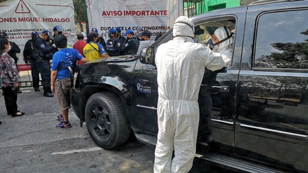 familiares-victimas-covid-buscan-entrar_thumb_593_348