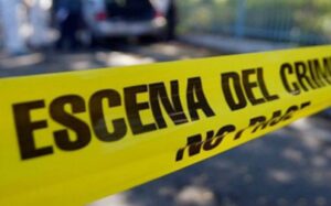 Escena del crimen con la cinta de no pasar
